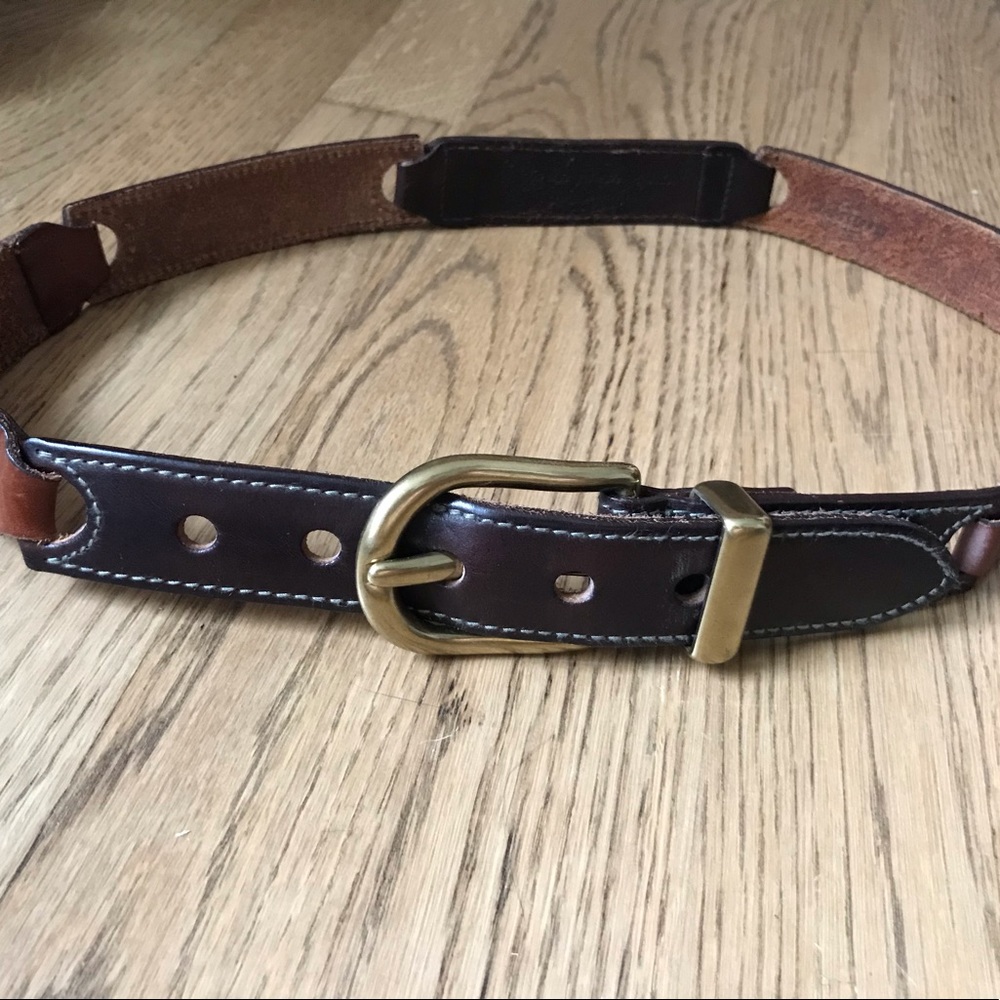Vintage fossil leather belt with brass hardware.